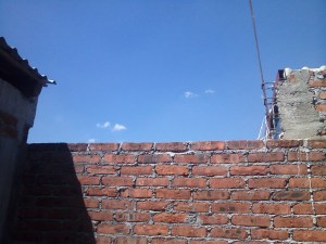 The place where the thieves jumped the wall into the neighbor's area. 